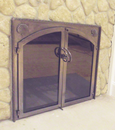 Allison All natural iron finish with twin doors, standard smoked glass. Comes with slide mesh spark screen.